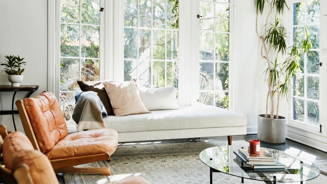 A living room with a sofa and coffee table