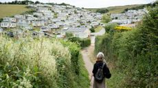 Walkers near a caravan park in Beer, Devon