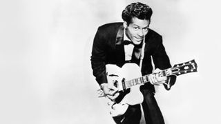 1959 : Photo of Chuck BERRY; Posed studio portrait of Chuck Berry with Gibson guitar