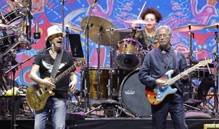 Carlos Santana (left) and Eric Clapton perform at the Crossroads Guitar Festival at the Crypto.com Arena in Los Angeles on September 24, 2023