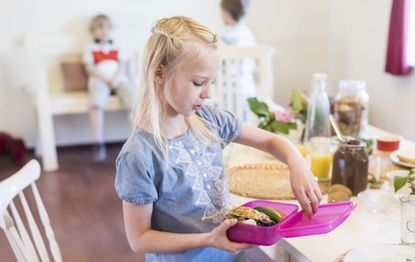 child with lunchbox