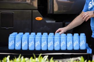 A staff member of the Great Britains Sky cycling team prepares water bottles prior to a training session at their hotel during a rest day as part of the 102nd edition of the Tour de France cycling race on July 21 2015 in Sisteron southern France AFP PHOTO ERIC FEFERBERG Photo credit should read ERIC FEFERBERGAFP via Getty Images