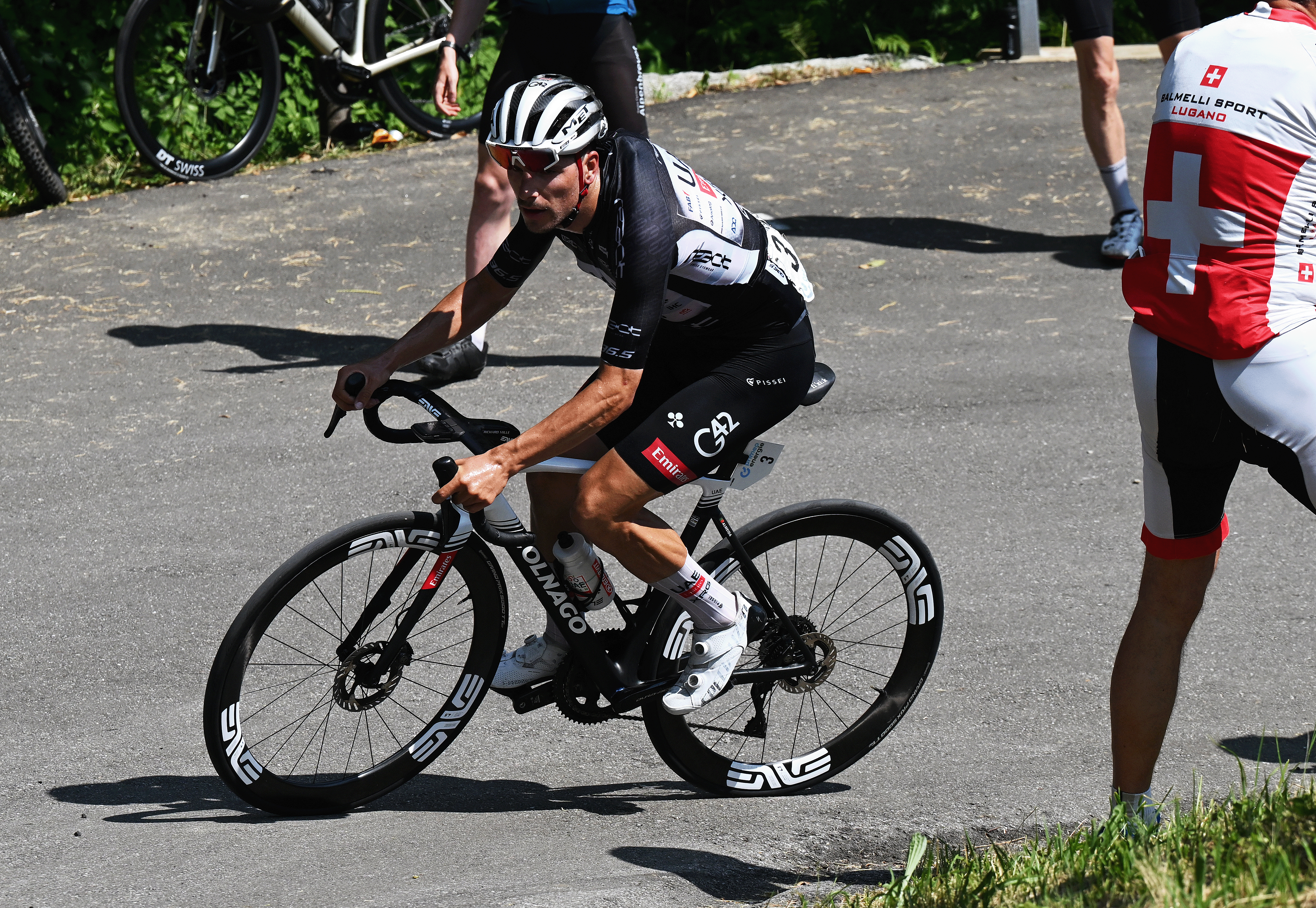 SANTA MARIA IN CALANCA, SWITZERLAND - JUNE 19: Joao Almeida of Portugal and UAE Team Emirates - XRG - Black Points Jersey competes during the 88th Tour de Suisse, Stage 5 a 183.8km stage from La Punt to Santa Maria in Calanca 941m / #UCIWT / on June 19, 2025 in Santa Maria in Calanca, Switzerland. (Photo by Tim de Waele/Getty Images)