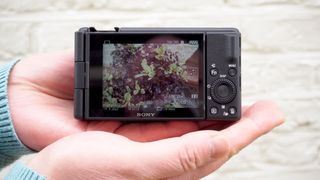 Sony ZV-1 II camera in the hand with rear screen