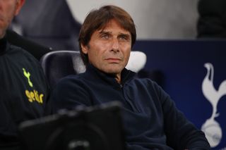 Antonio Conte looks on from the bench while managing Tottenham, 2022