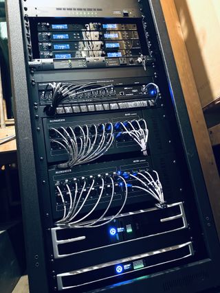 An AV rack with LEA Professional gear.