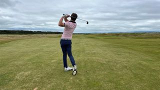 Andrew Wright hitting a full shot with a Callaway Jaws Raw wedge