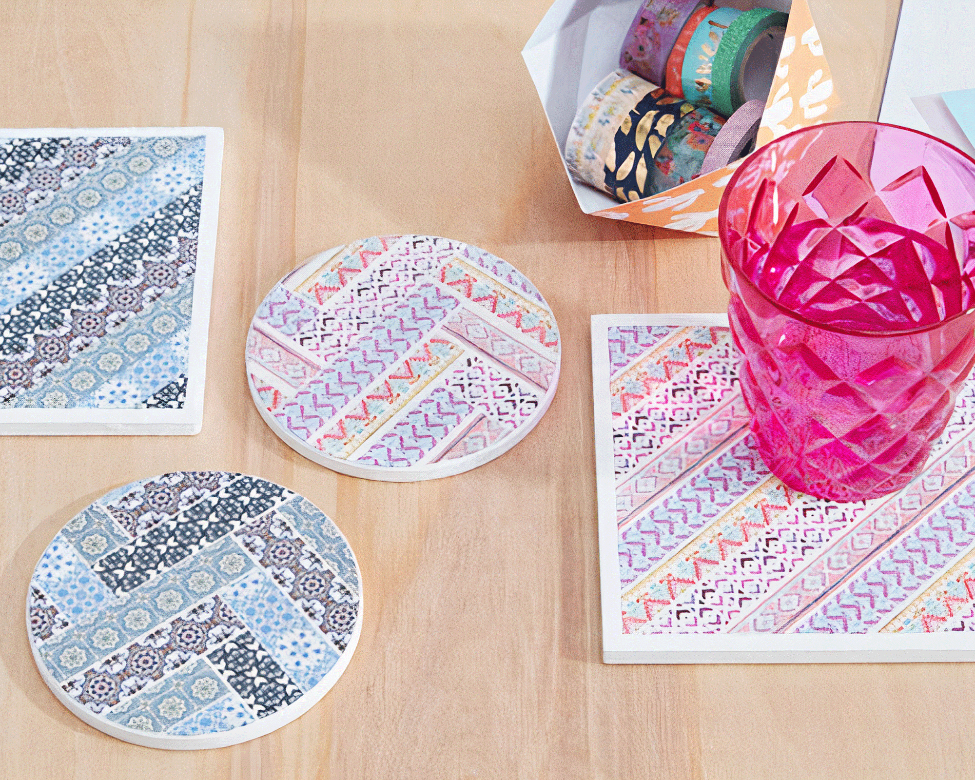 Colorful DIY washi tape coasters with mixed patterns.