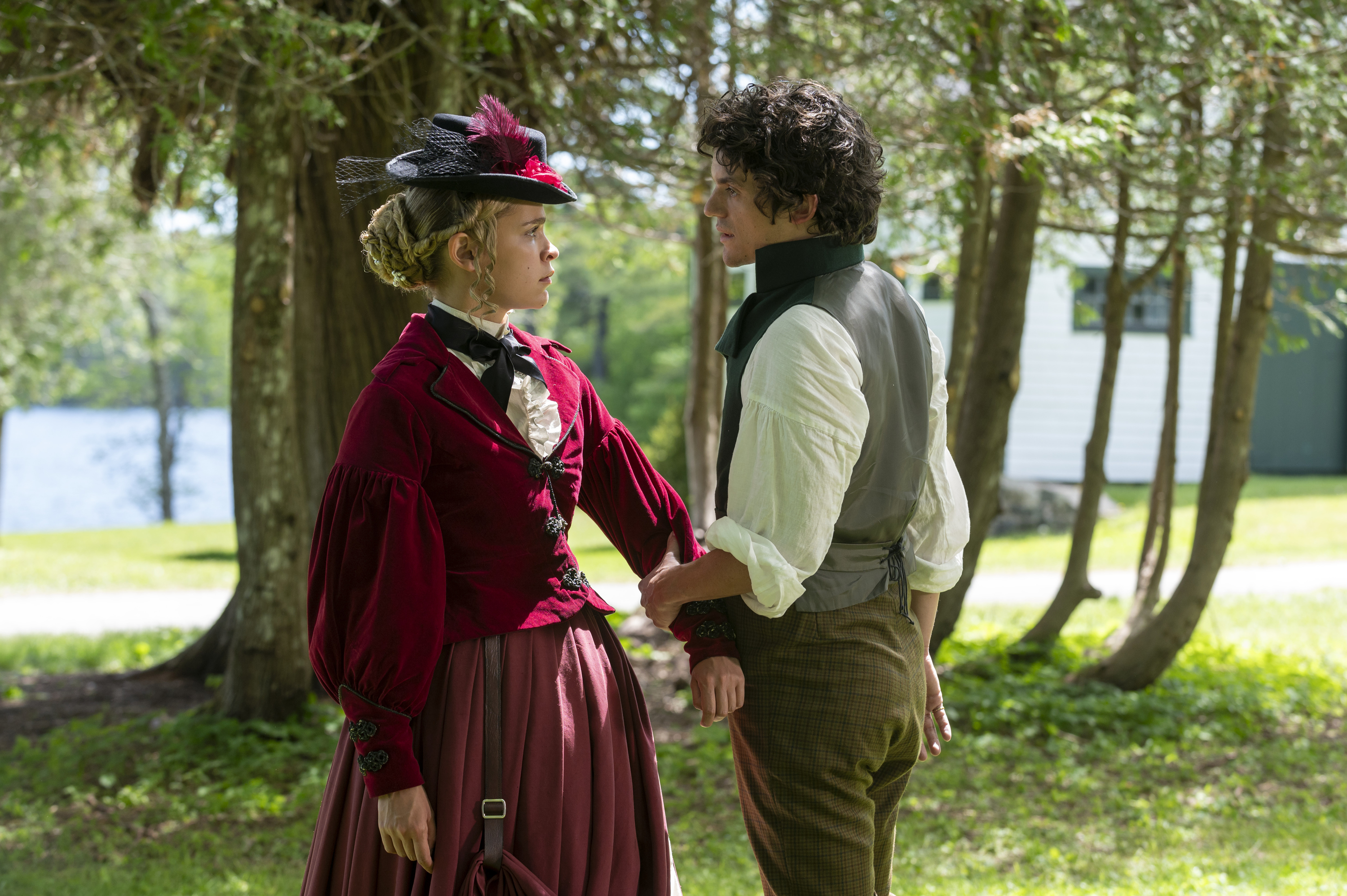 Iola Evans as Tanna and Edward Bluemel as Billy, standing outdoors while wearing period costumes, in 'Washington Black.'