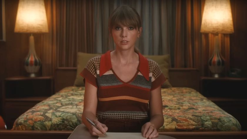 Taylor Swift taking notes in the Anti-Hero music video