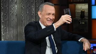 Tom Hanks holding the Diet Cokagne on The Late Show with Stephen Colbert
