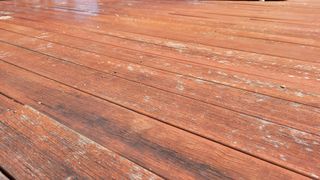 Sun damaged and faded timber decking