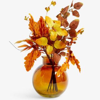 AUtumnal flowers in a orange vase
