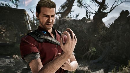 Gothic Remake armour: The Nameless Hero wearing a red shirt, looking awkwardly at their right hand.