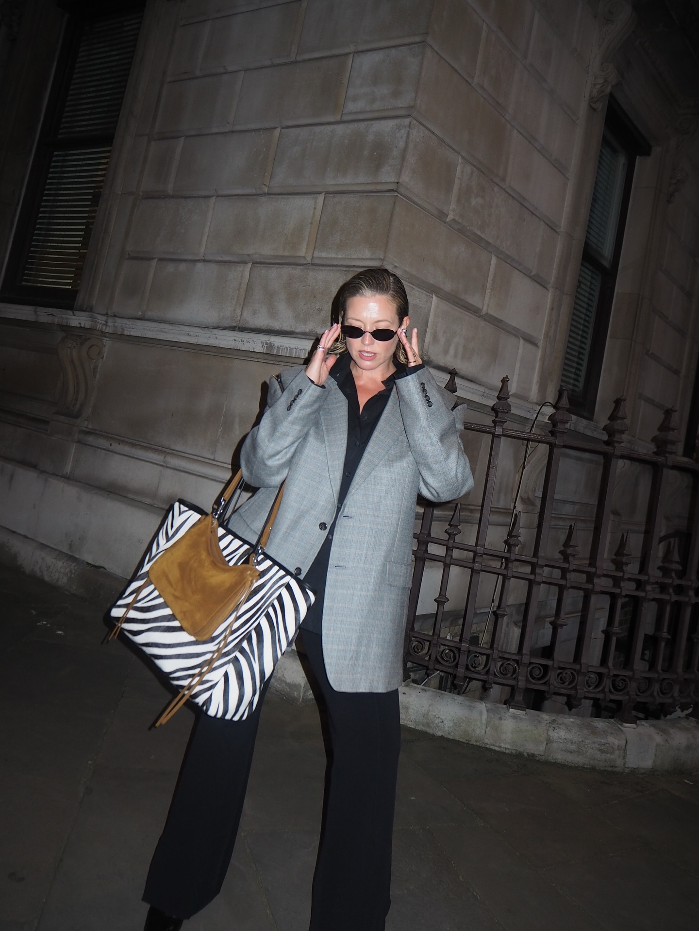 Alexis wearing zebra print bag