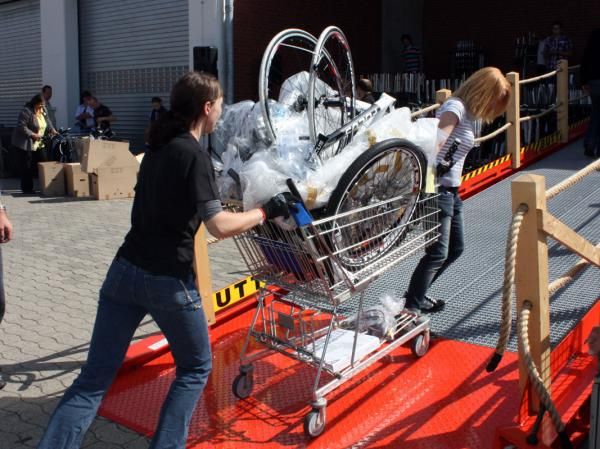 This dealer has a shopping cart full of items from the flea market - but others ship back entire pallets of gear for their stores.