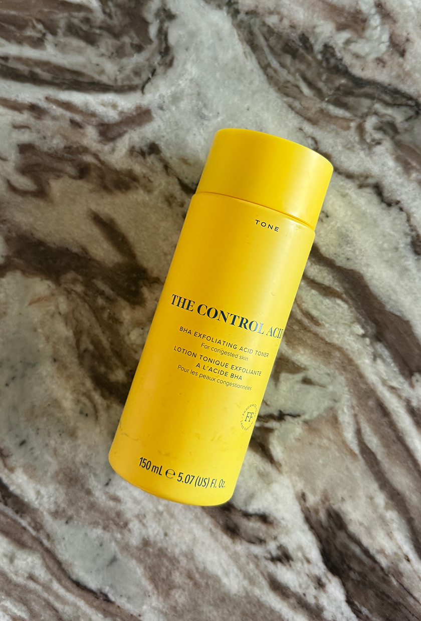 A photo of Skin Rocks exfoliator on a marble table