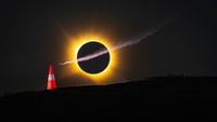 Mike Brewer wing-suits past the total eclipse in Alarilla, Spain on August 12, 2026. // Noah Wetzel / Red Bull Content Pool // SI202608130002 // Usage for editorial use only //