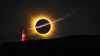 Mike Brewer wing-suits past the total eclipse in Alarilla, Spain on August 12, 2026. // Noah Wetzel / Red Bull Content Pool // SI202608130002 // Usage for editorial use only //