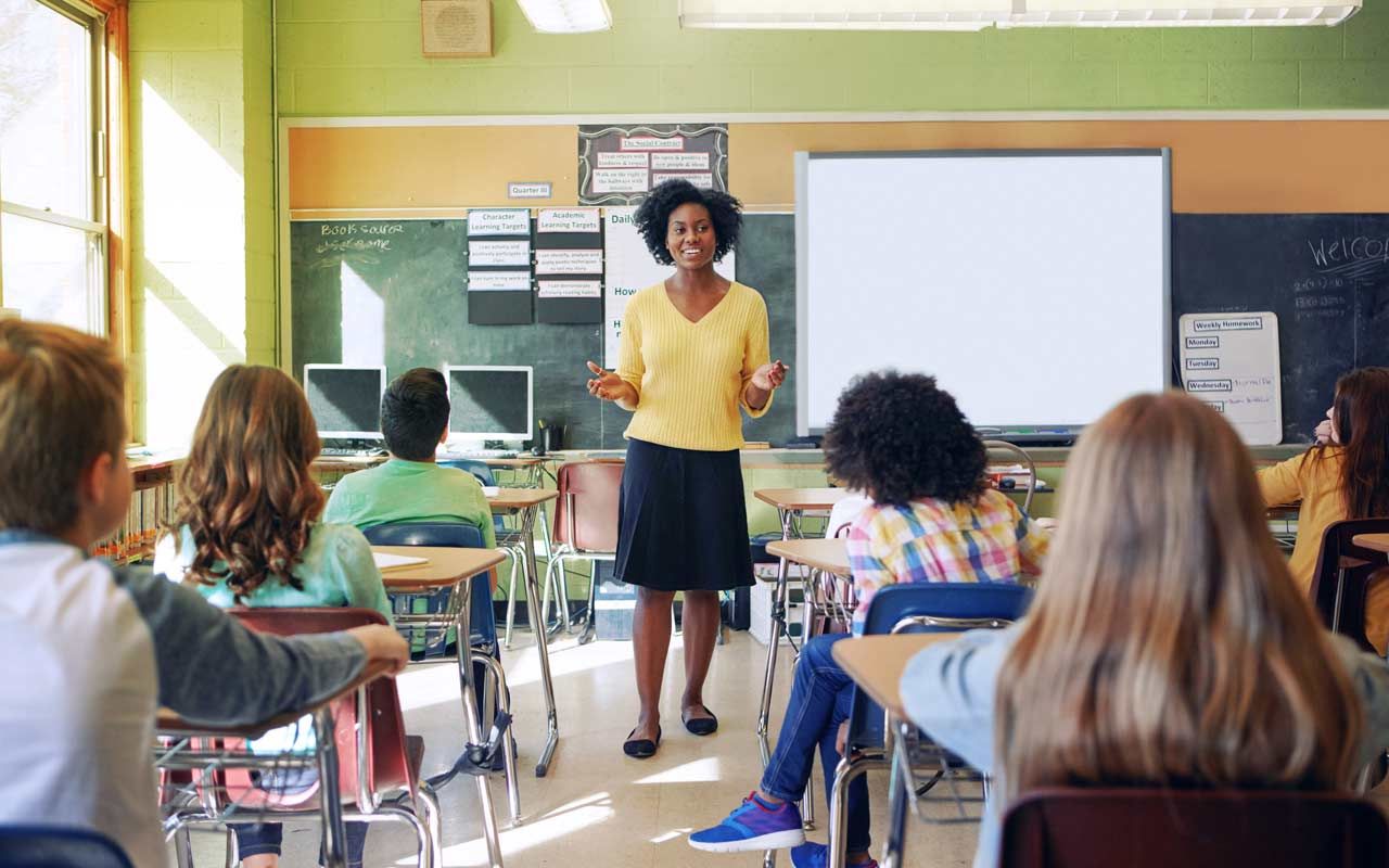 picture of a teacher and students in a classroom