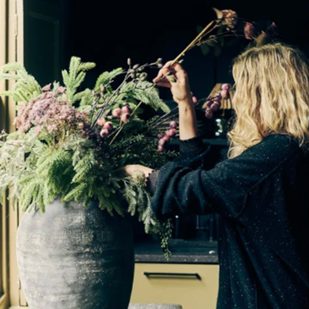 Interior designer Abigail Ahern styling flowers