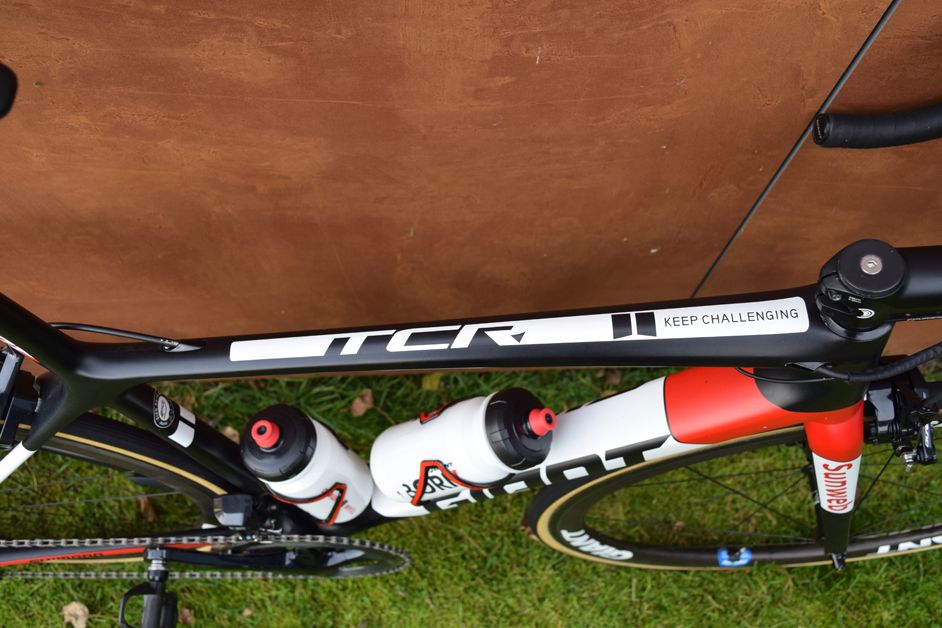 The team's motto adorns the top tube of the bike