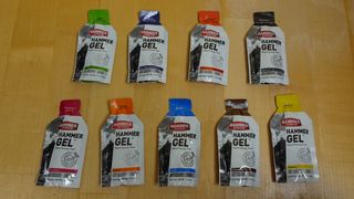 Hammer energy gels for cycling on a wooden table