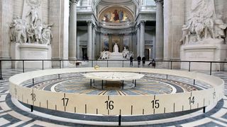 A Foucault pendulum swings in the Panthéon in Paris, France on April 4, 2016.