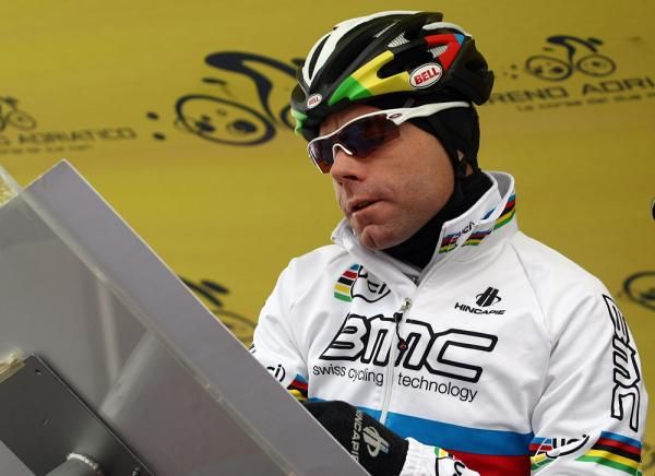 Cadel Evans (BMC) bundled up for sign in.