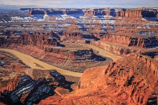 The red rocks of Dead Horse Point State Park in Utah covered with white snow