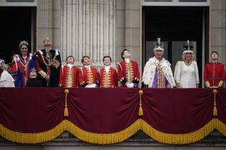 Prince Edward, Duke of Edinburgh, James, Earl of Wessex, Lady Louise Windsor, Vice Admiral Sir Timothy Laurence, Sophie, Duchess of Edinburgh, Princess Charlotte of Wales, Anne, Princess Royal, Catherine, Princess of Wales, Prince Louis of Wales, Prince William, Prince of Wales, guest and Prince George of Wales gather on the Buckingham Palace central balcony after the Coronation service of King Charles III and Queen Camilla on May 06, 2023 in London, England. The Coronation of Charles III and his wife, Camilla, as King and Queen of the United Kingdom of Great Britain and Northern Ireland, and the other Commonwealth realms takes place at Westminster Abbey today. Charles acceded to the throne on 8 September 2022, upon the death of his mother, Elizabeth II. (Photo by Christopher Furlong/Getty Images)
