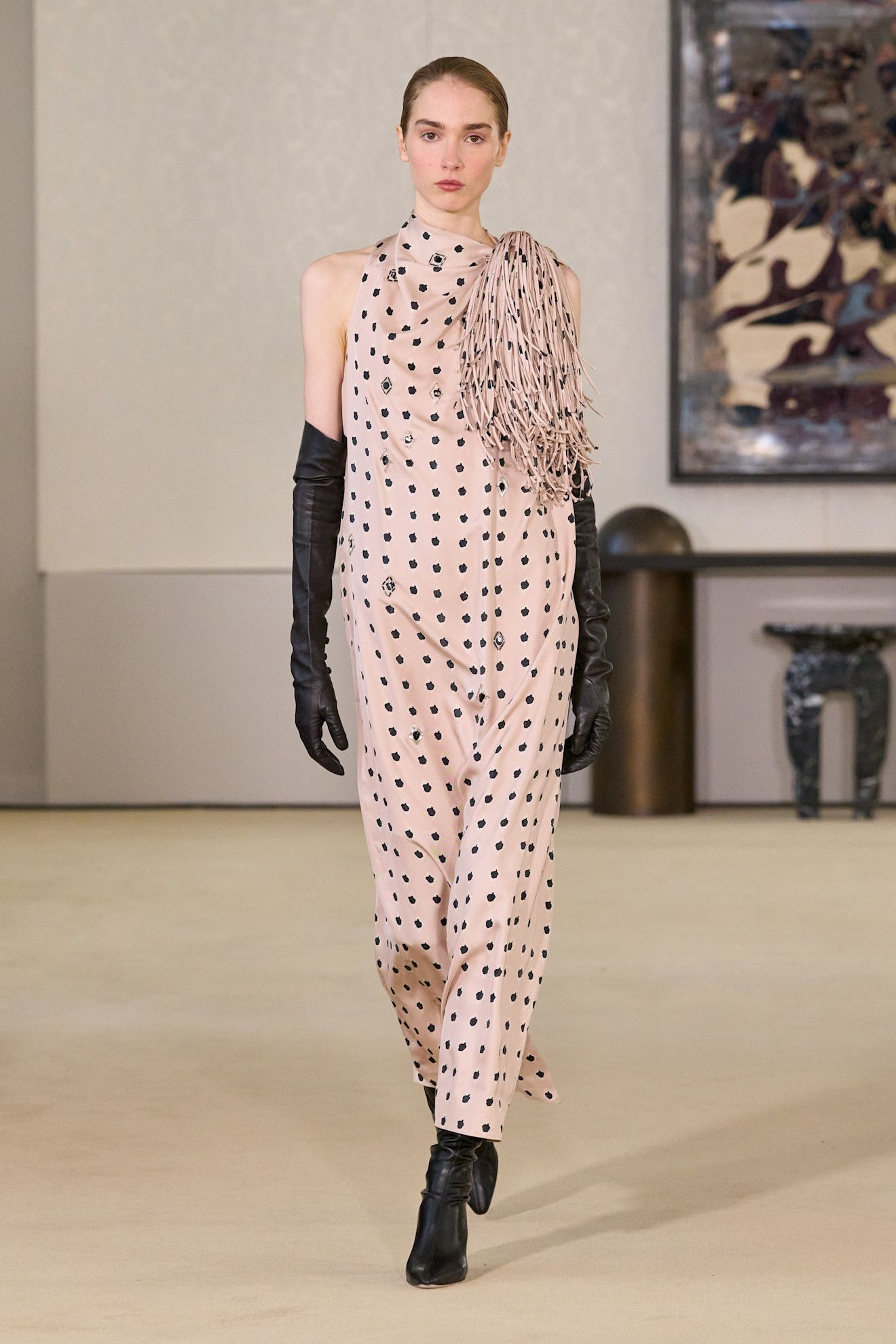 Photo of model wearing printed dress trend from New York Fashion Week Fall Winter 2026 runway show.