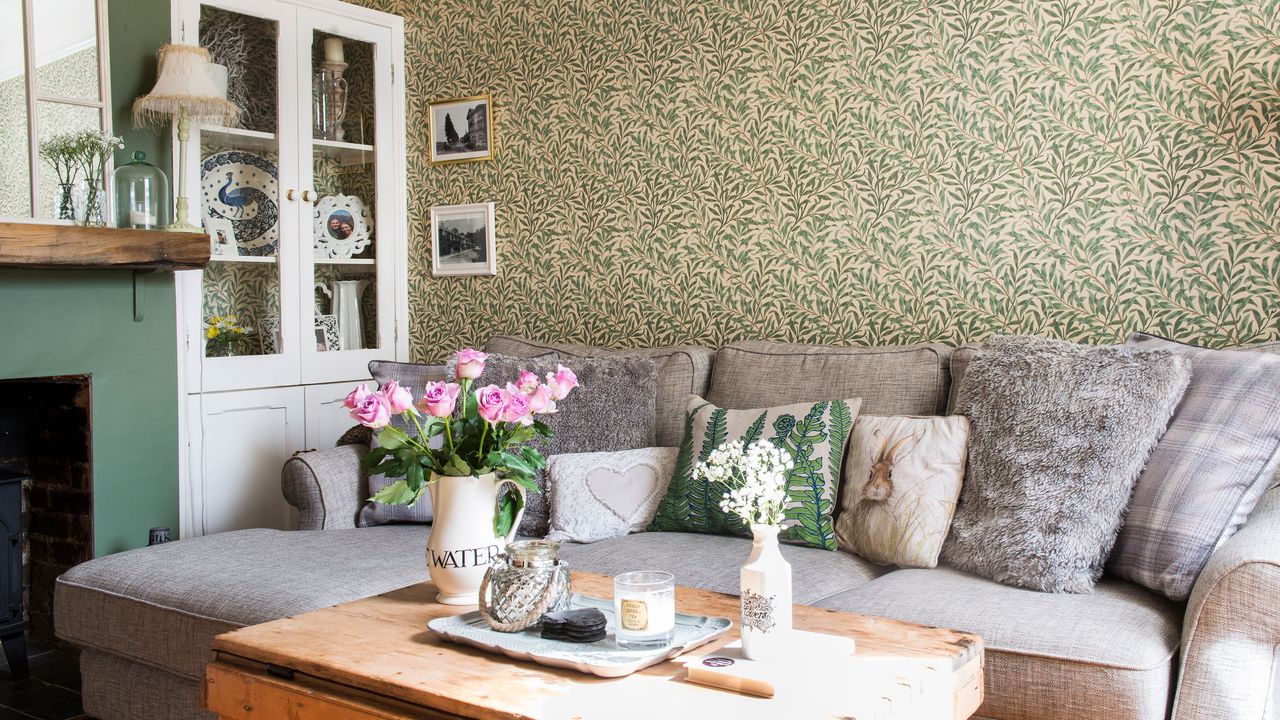 Green leaf wallpaper and sofa