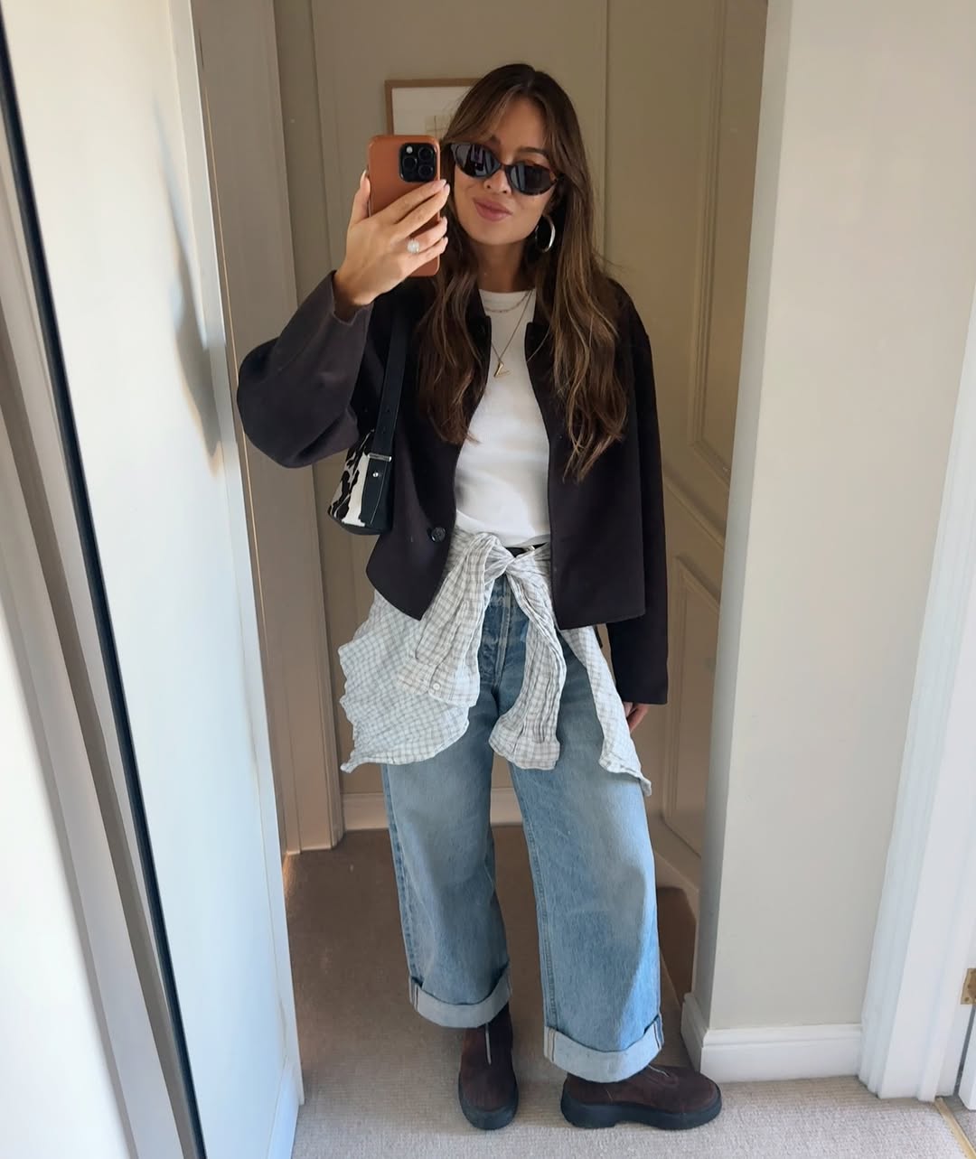 Stylish women wearing winter trends with jeans.