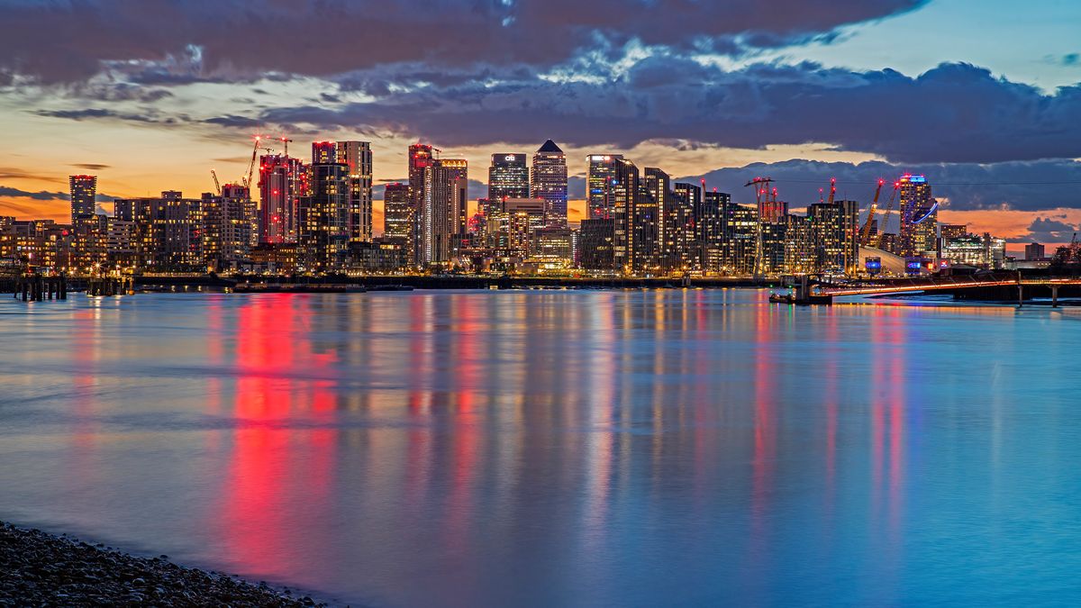 London skyline from the Thames Barrier, London, United Kingdom. Photo Taken in the Spring 2024 from New Charlton, East London, at sunset.