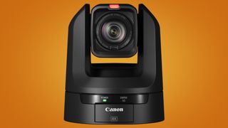 The Canon CRN 300 PTZ camera on an orange background