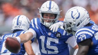 CINCINNATI, OHIO - AUGUST 23: Riley Leonard #15 of the Indianapolis Colts hands off to Ulysses Bentley IV #37 of the Indianapolis Colts during the NFL Preseason 2025 game between Indianapolis Colts and Cincinnati Bengals at Paycor Stadium on August 23, 2025 in Cincinnati, Ohio. (Photo by Michael Hickey/Getty Images)
