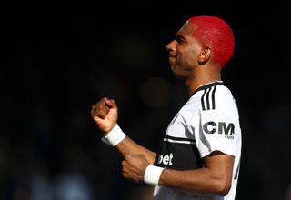 Ryan Babel of Fulham celebrates after scoring his team's second goal during the Premier League match between Fulham FC and Everton FC at Craven Cottage on April 13, 2019 in London, United Kingdom.