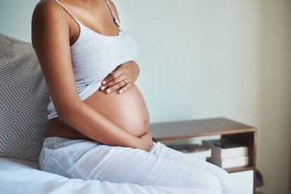 Pregnant woman membrane sweep