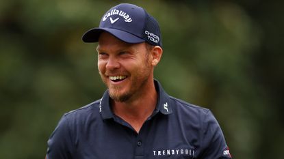 Danny Willett of England reacts on the first green during the first round of the 2024 Masters Tournament at Augusta National Golf
