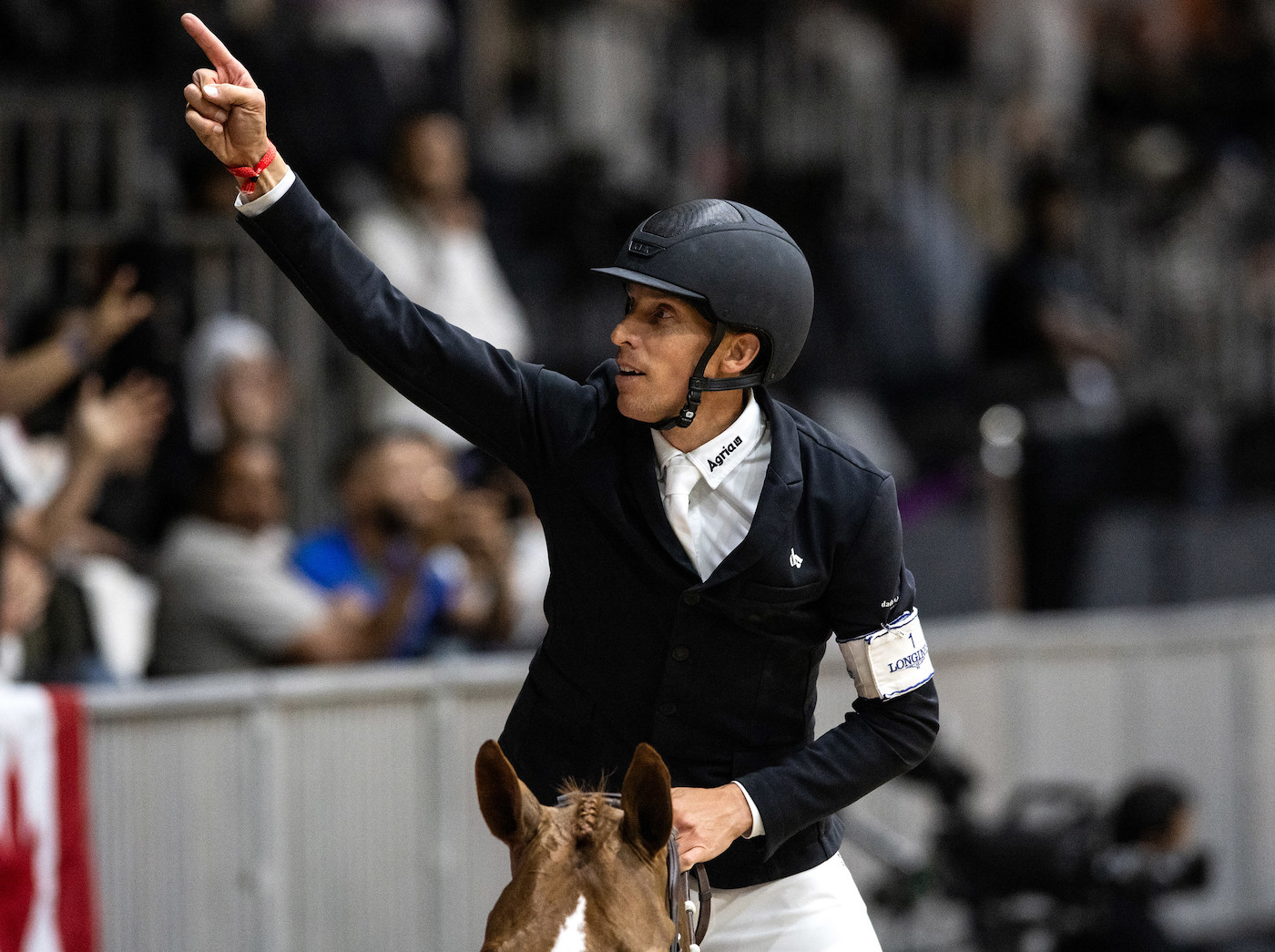 Henrik von Eckerman celebrates victory at the jumping world cup finals on King Edward