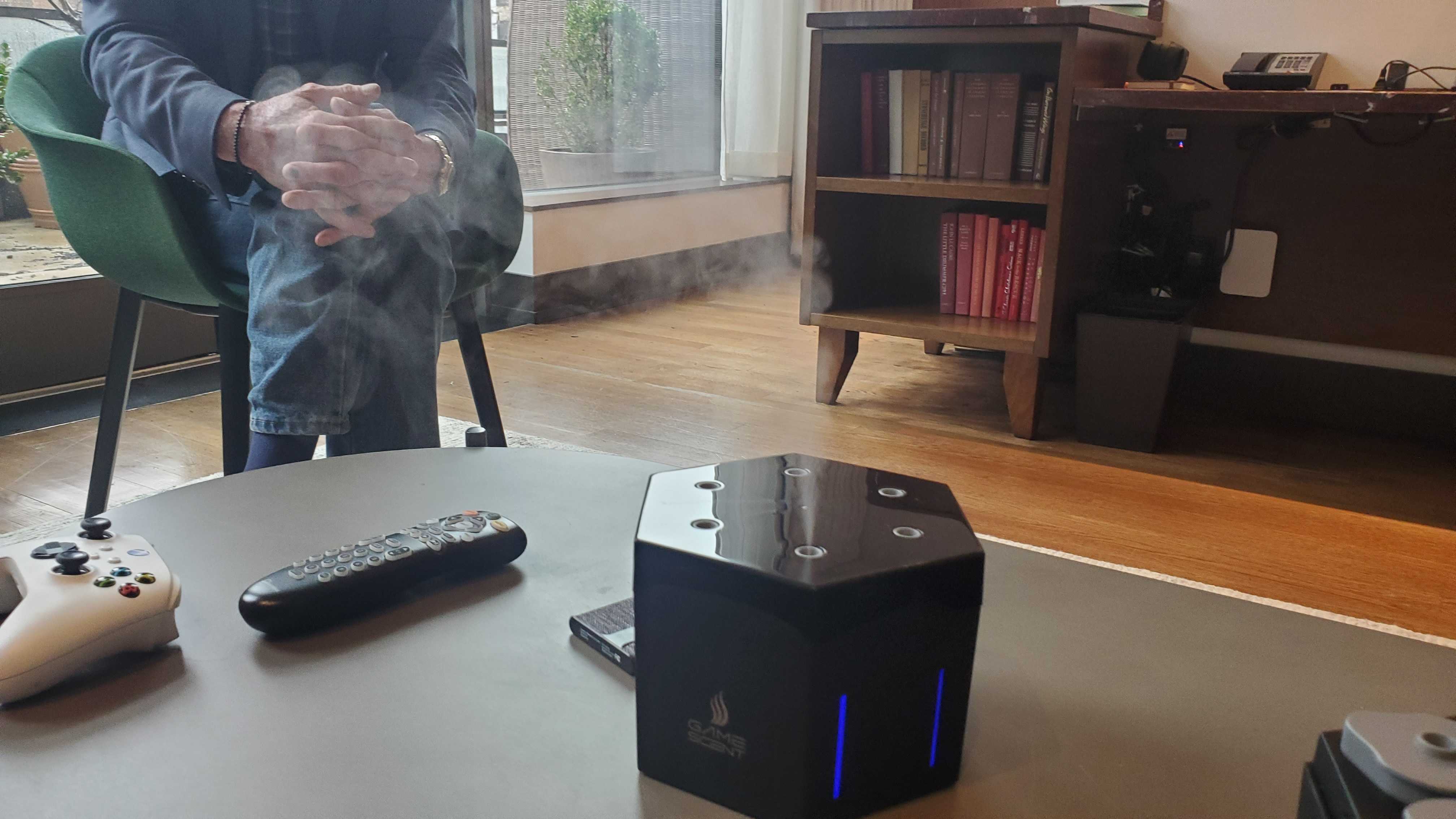 black GameScent device on wooden table