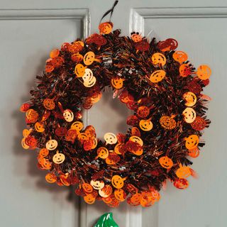 aldi halloween tinsel wreath on a front door
