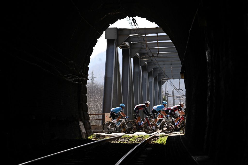 From L Breakaway riders Team EOLO Kometa Cycling Teams Diego Pablo Sevilla of Spain Team Andronis Ricardo Zurita of Spain Team EOLO Kometa Cycling Teams Samuele Rivi of Italy and Team Andronis Filippo Tagliani of Italy cross railway tracks near Ovada Piedmont during the 113th MilanSan Remo oneday classic cycling race on March 19 2022 between Milan and San Remo northern Italy Photo by Marco BERTORELLO AFP Photo by MARCO BERTORELLOAFP via Getty Images