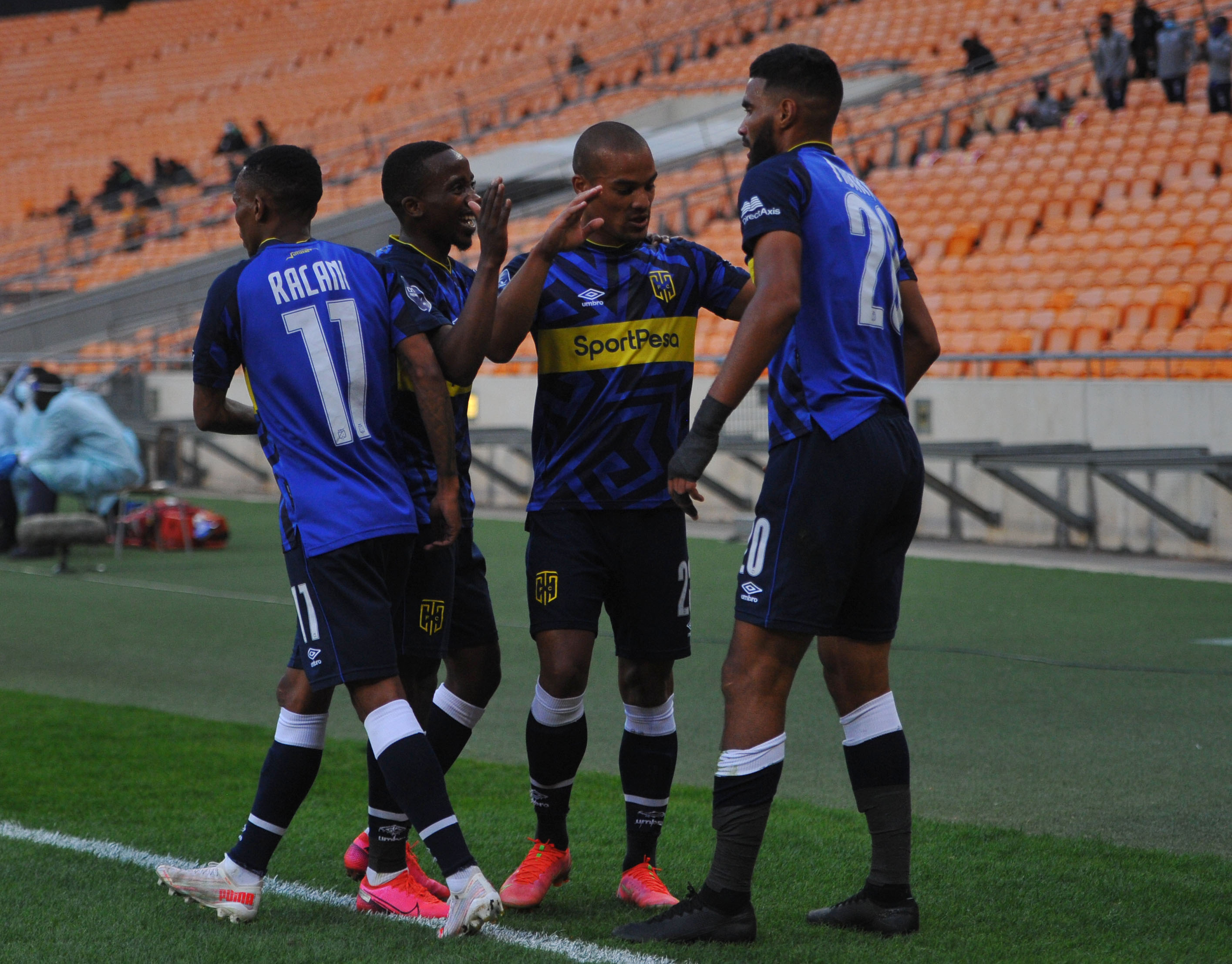 Tashreeq Morris of Cape Town City celebrates his goal with teammates