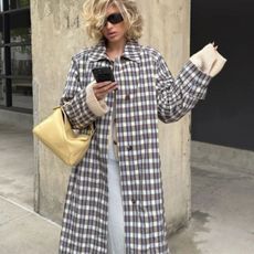 checked trench coat