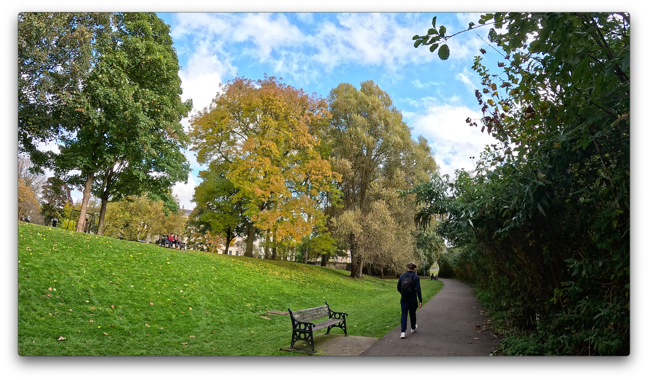 Screen grabs of test footage shot on the GoPro Hero13 Black showing an outdoor park scene.