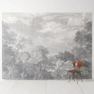 gray wall mural with forest landscape
