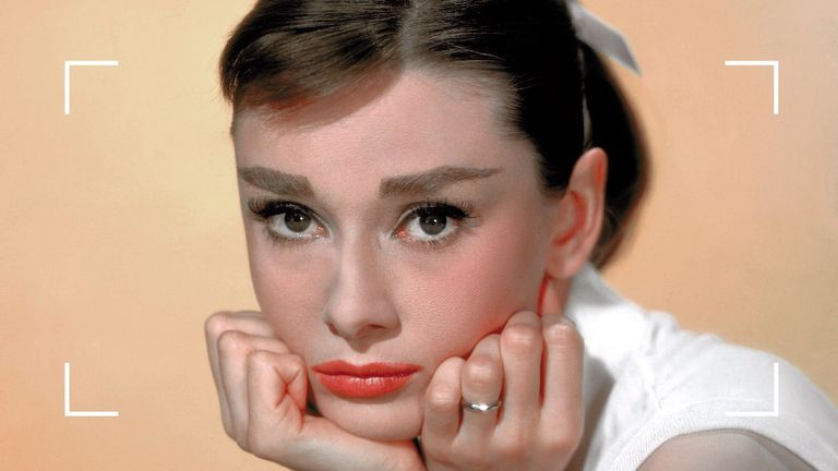 Audrey hepburn's eyebrow shapes, Audrey pictured with an orange backdrop