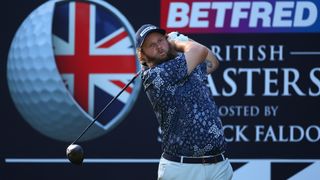 Andrew Johnston takes tee a shot at the Betfred British Masters